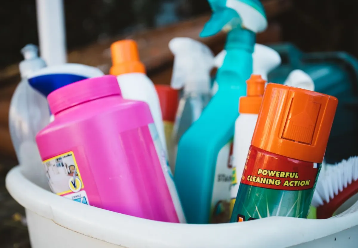 Basket of cleaning supplies ready for restocking a rental