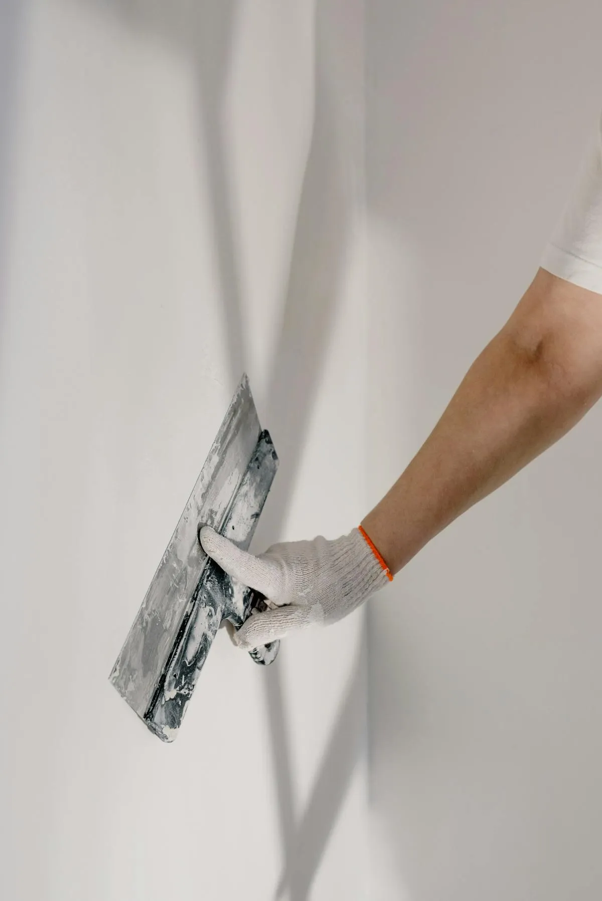 Maintenance professional repairing equipment in a vacation rental property